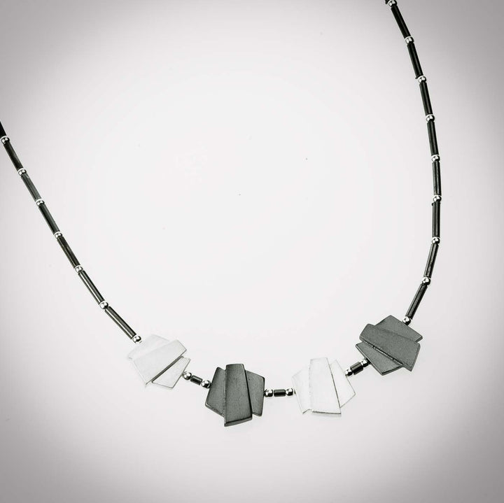 Trapezi 4 pieces silver short necklace