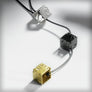 Necklace with 3 tricolour cubes