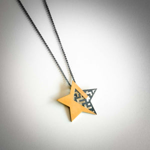 Necklace with large golden star