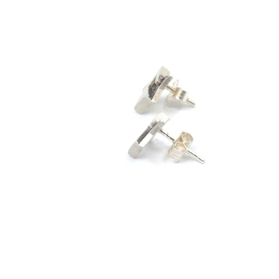 Pendientes botón estrella de plata, colección Estrella · Nerea Aixàs