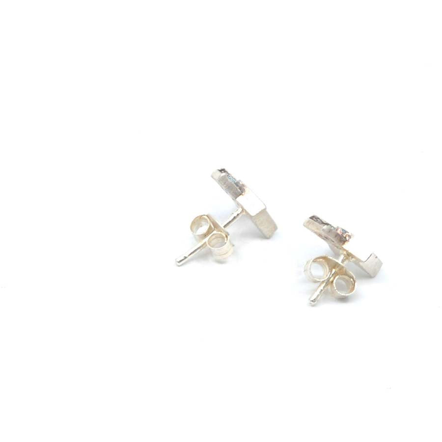 Pendientes botón estrella de plata, colección Estrella · Nerea Aixàs