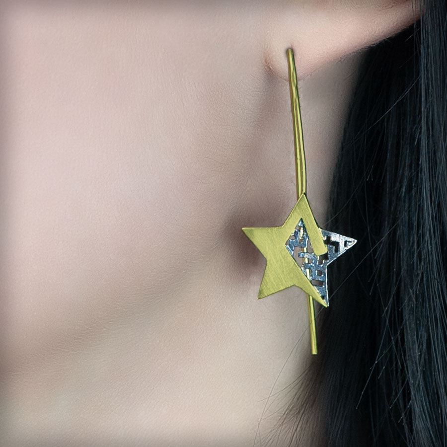 Arracades estrella de plata daurada, col·lecció Estrella · Nerea Aixàs